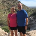 two people posing in desert